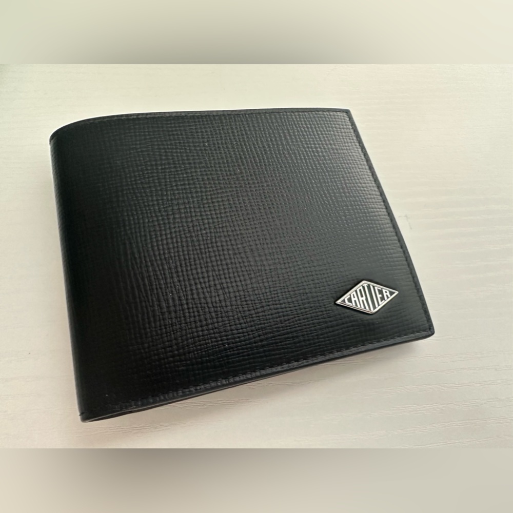 I’m selling a leather real Cartier wallet I paid 700 asking 500.